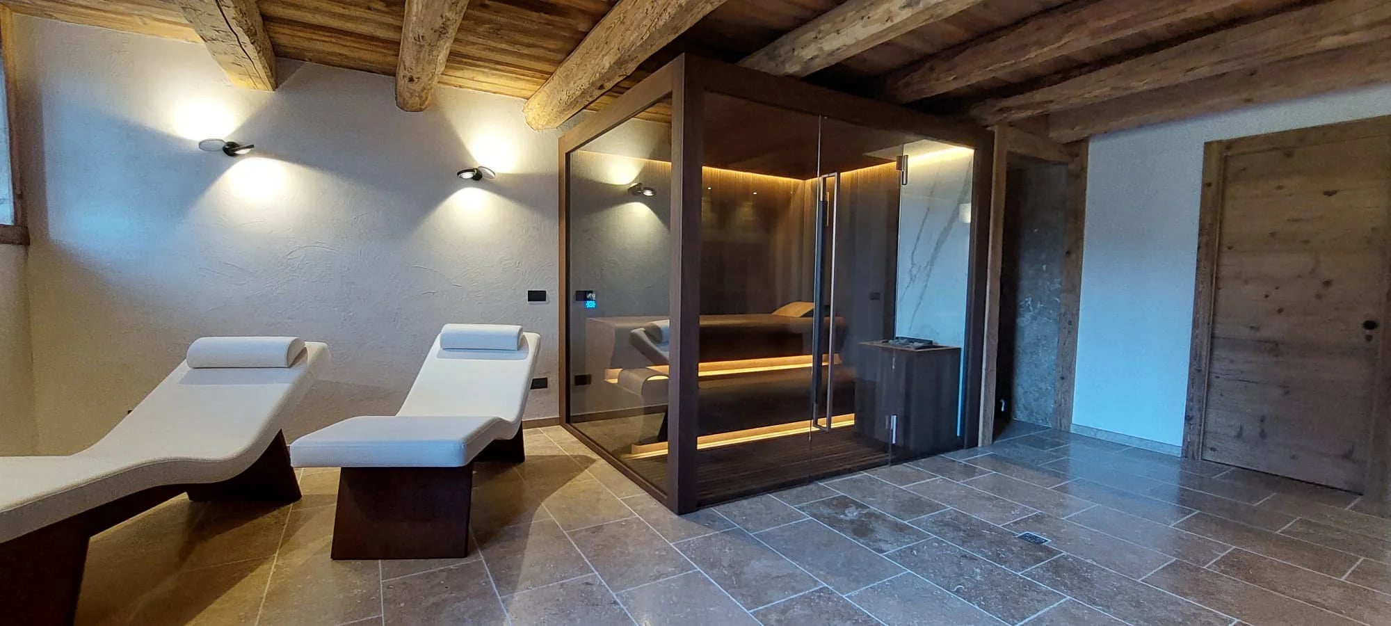 Wide view of an INFINITY sauna and relaxation area