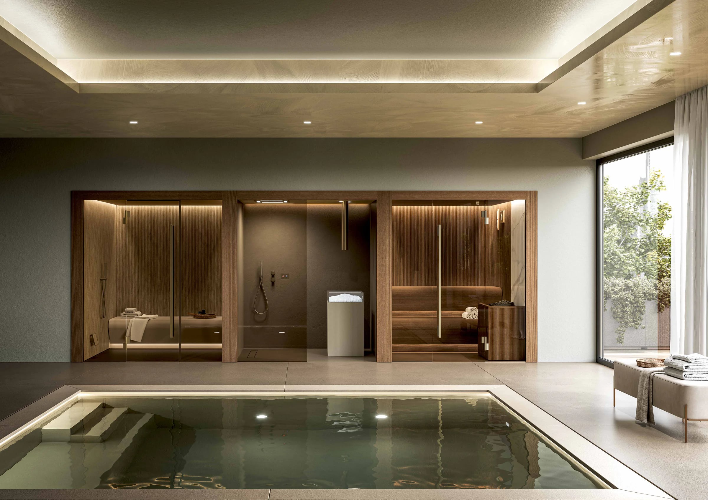 Wide view of an INFINITY wellness suite beside an indoor pool