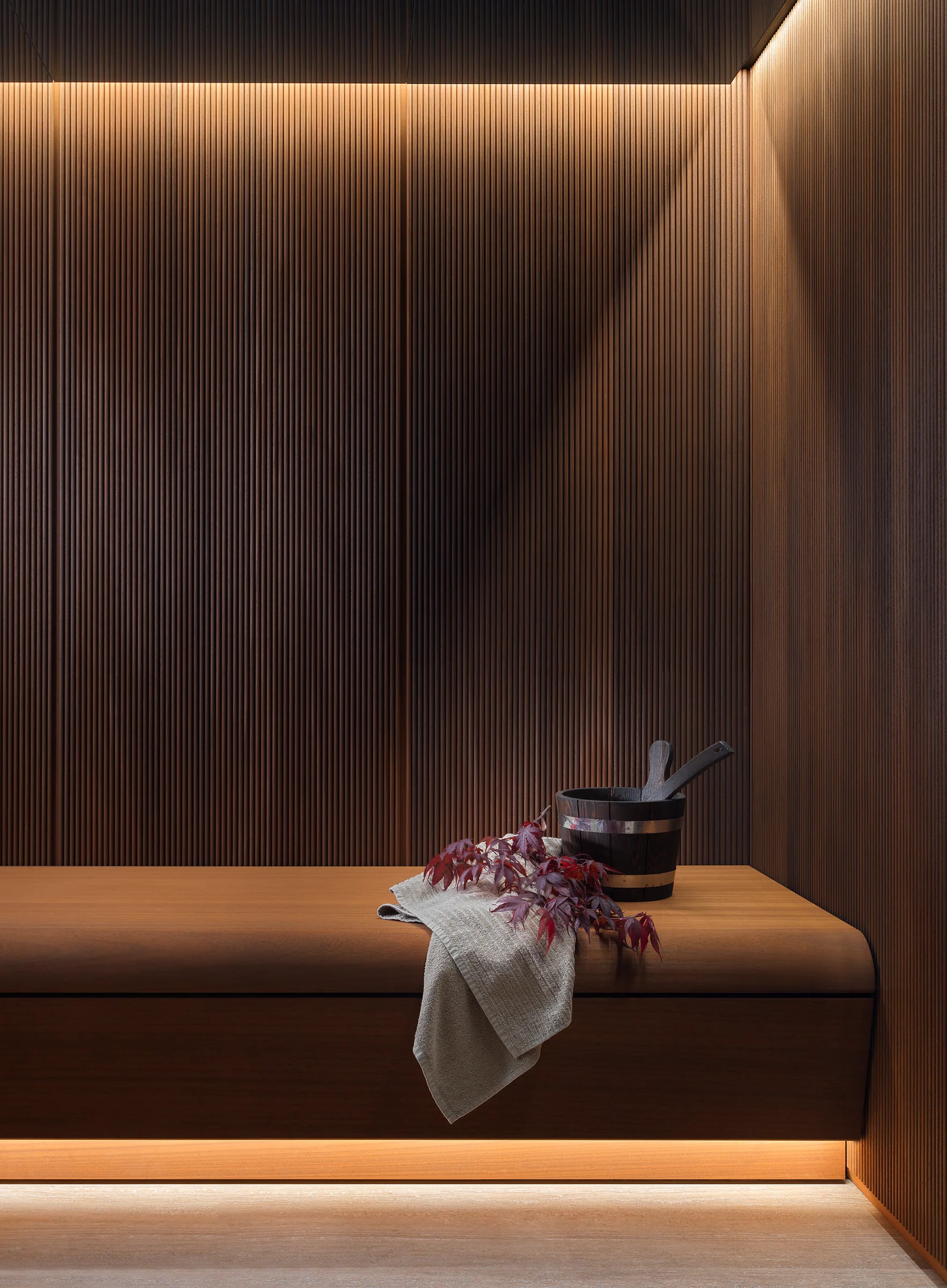 Upholstered sauna bench and integrated lighting detail