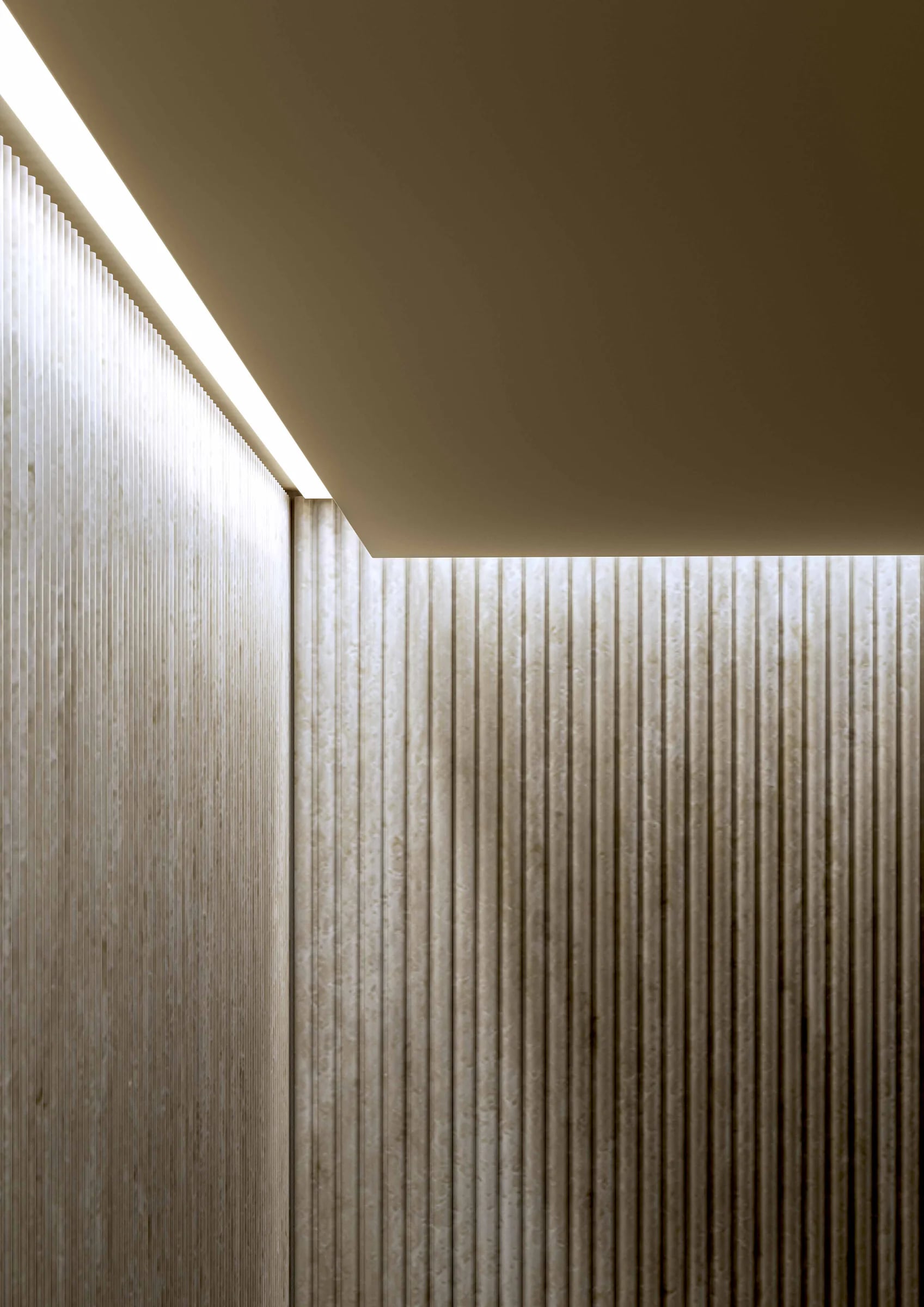 Ribbed steam room wall panels with concealed perimeter lighting